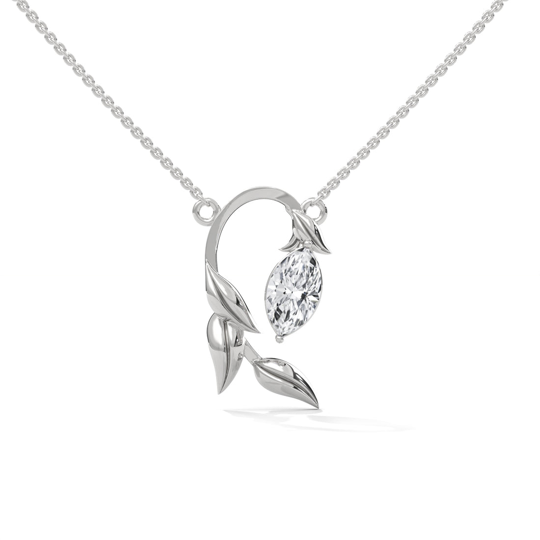 Silver necklace with a leaf design and central gemstone on a white background