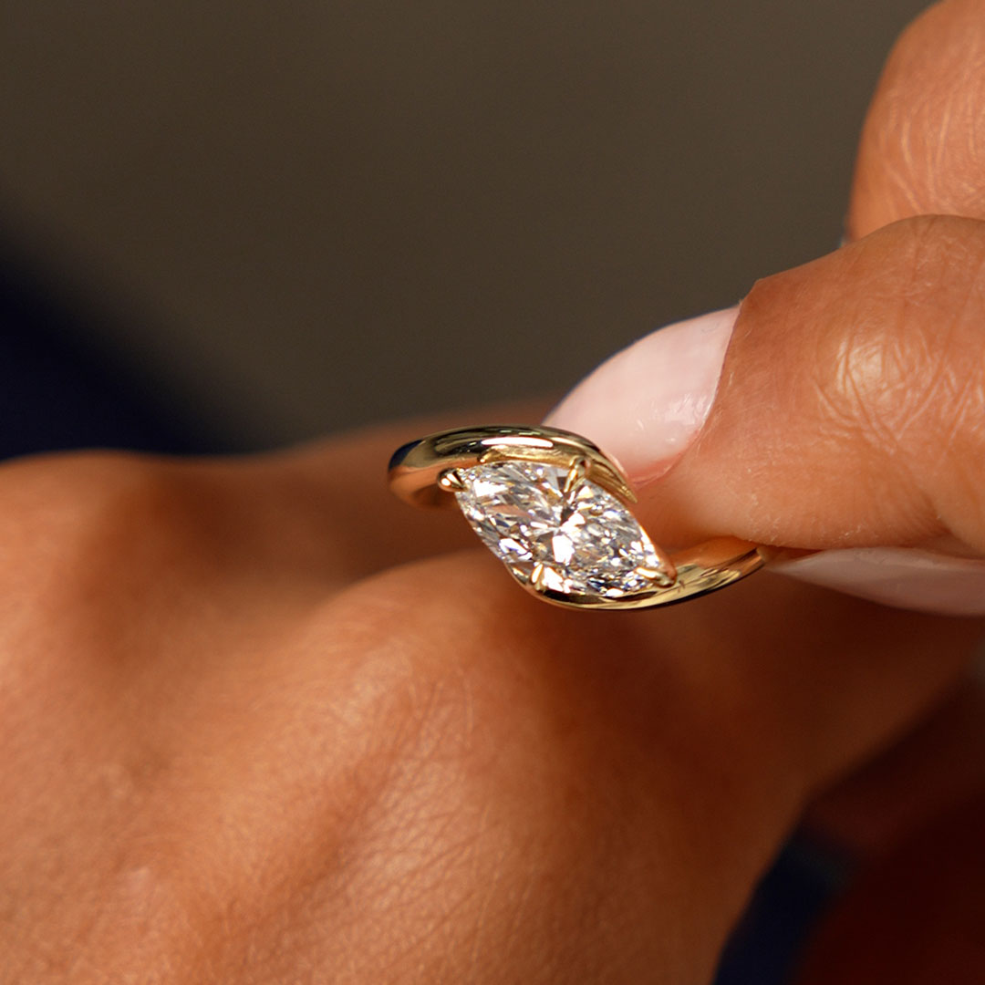 Marquise Shaped Lab Grown Diamond Criss Cross Engagement Ring