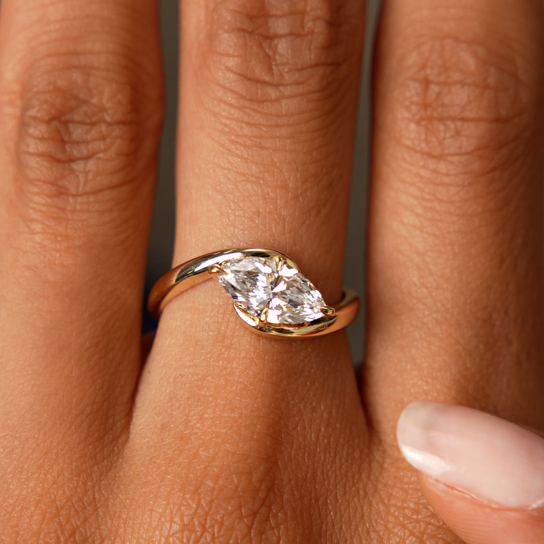 Marquise Shaped Lab Grown Diamond Criss Cross Engagement Ring