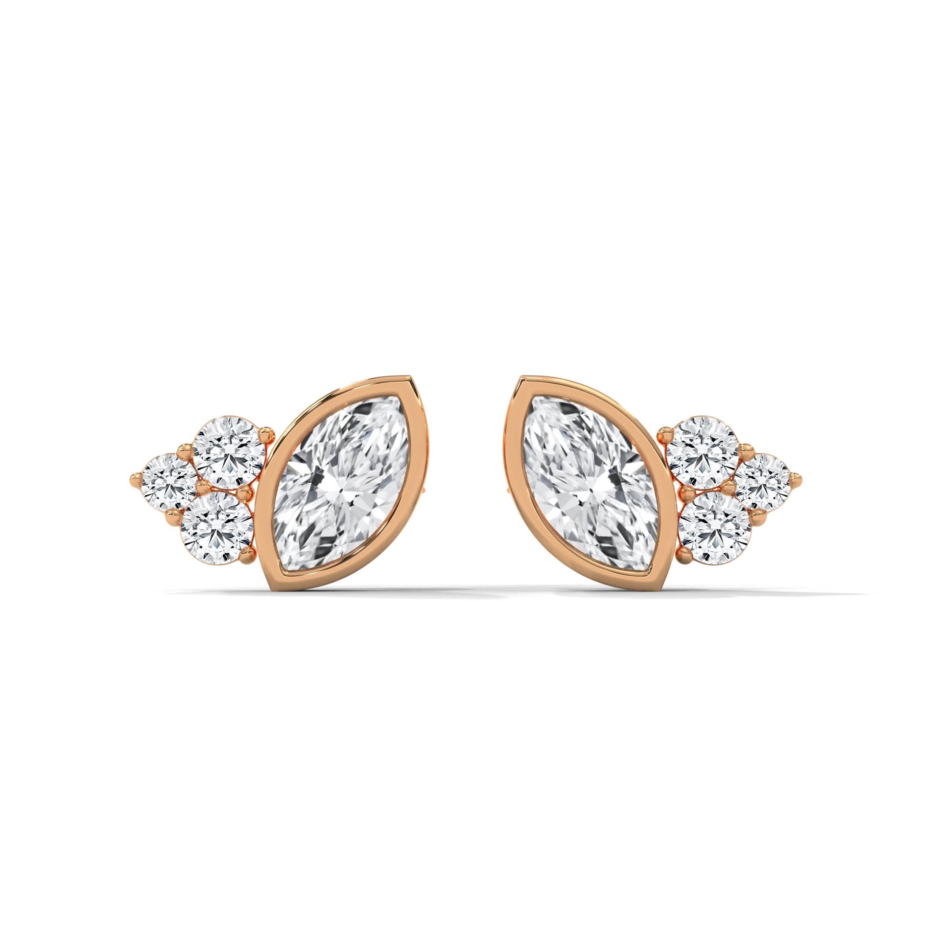 Pair of diamond earrings with rose gold setting on a white background
