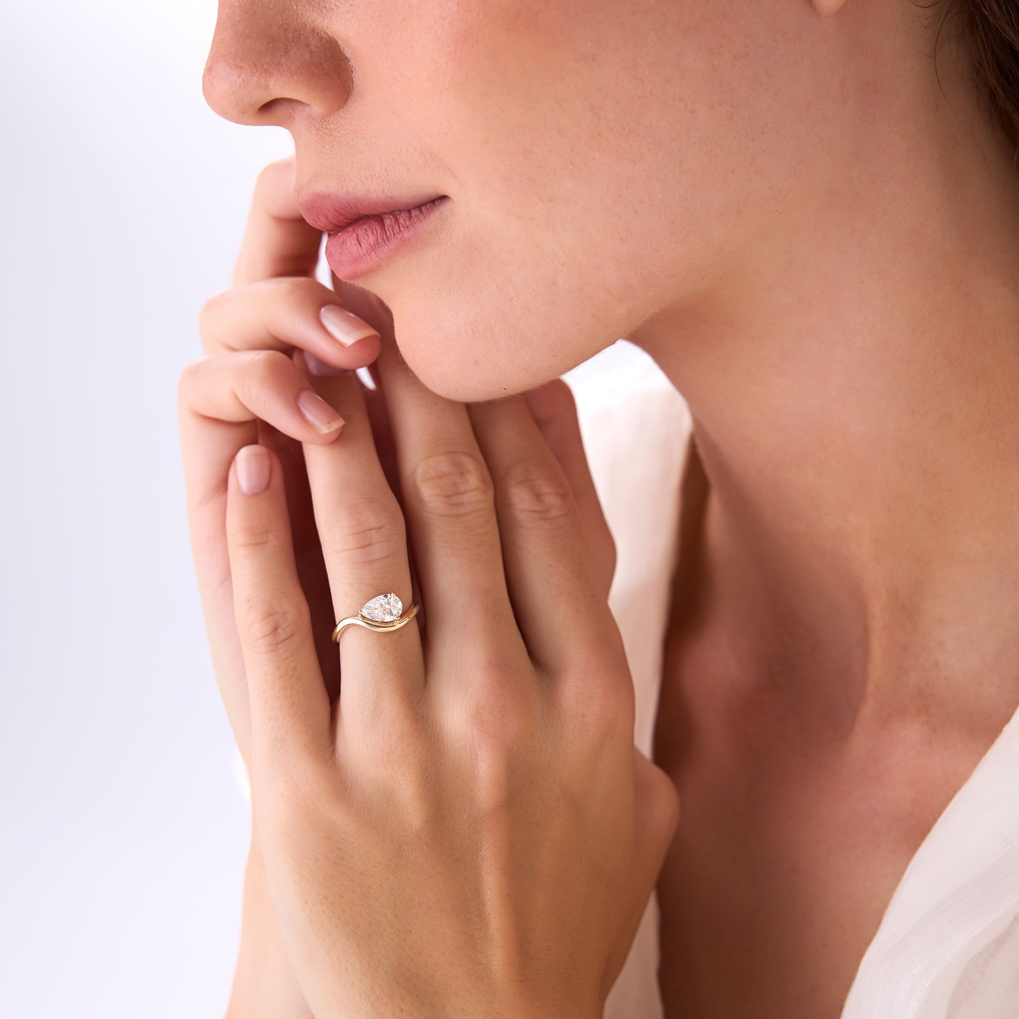 Modern Wavy Pear Shaped Lab Grown Diamond Engagement Ring