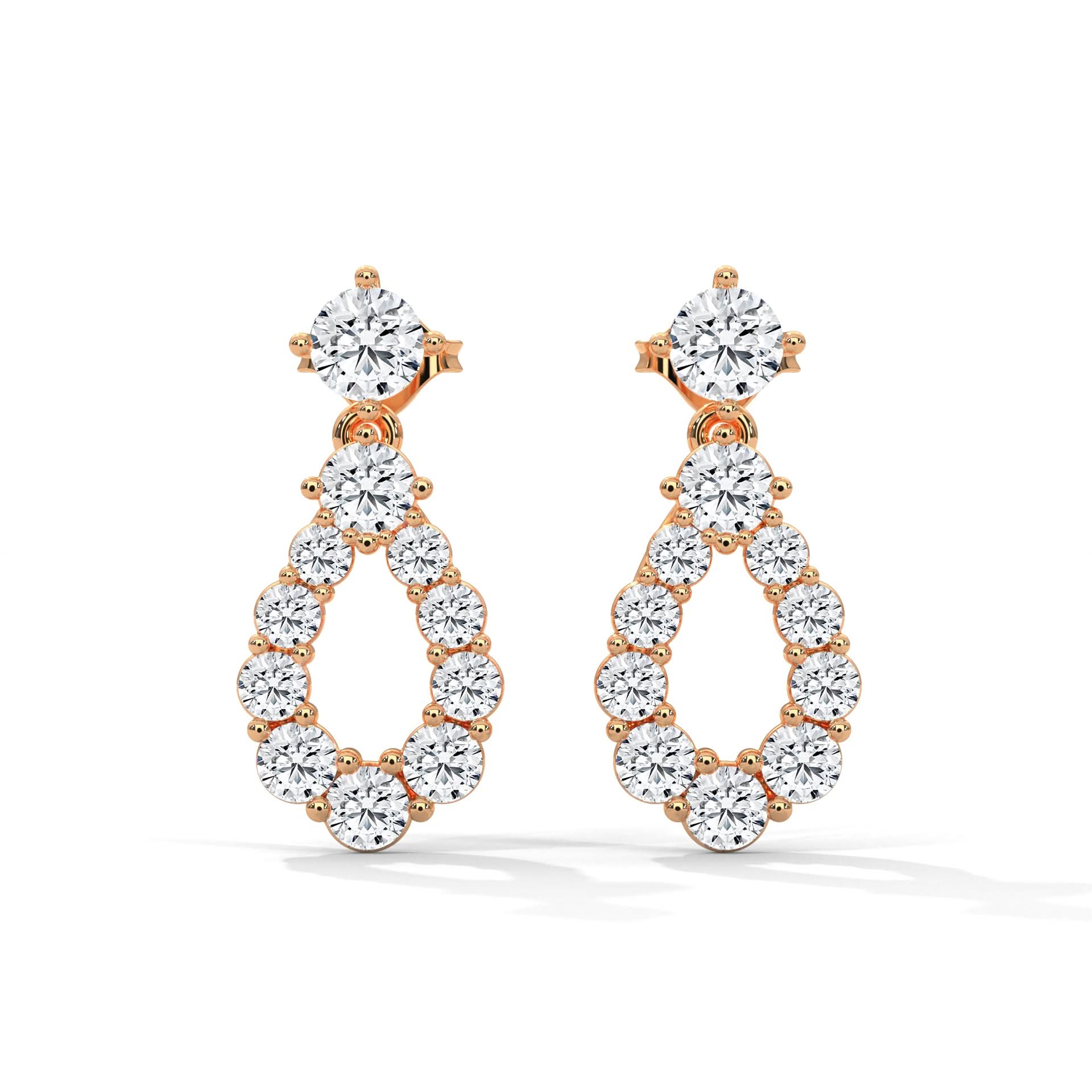 Rose gold and clear crystal earrings on a white background