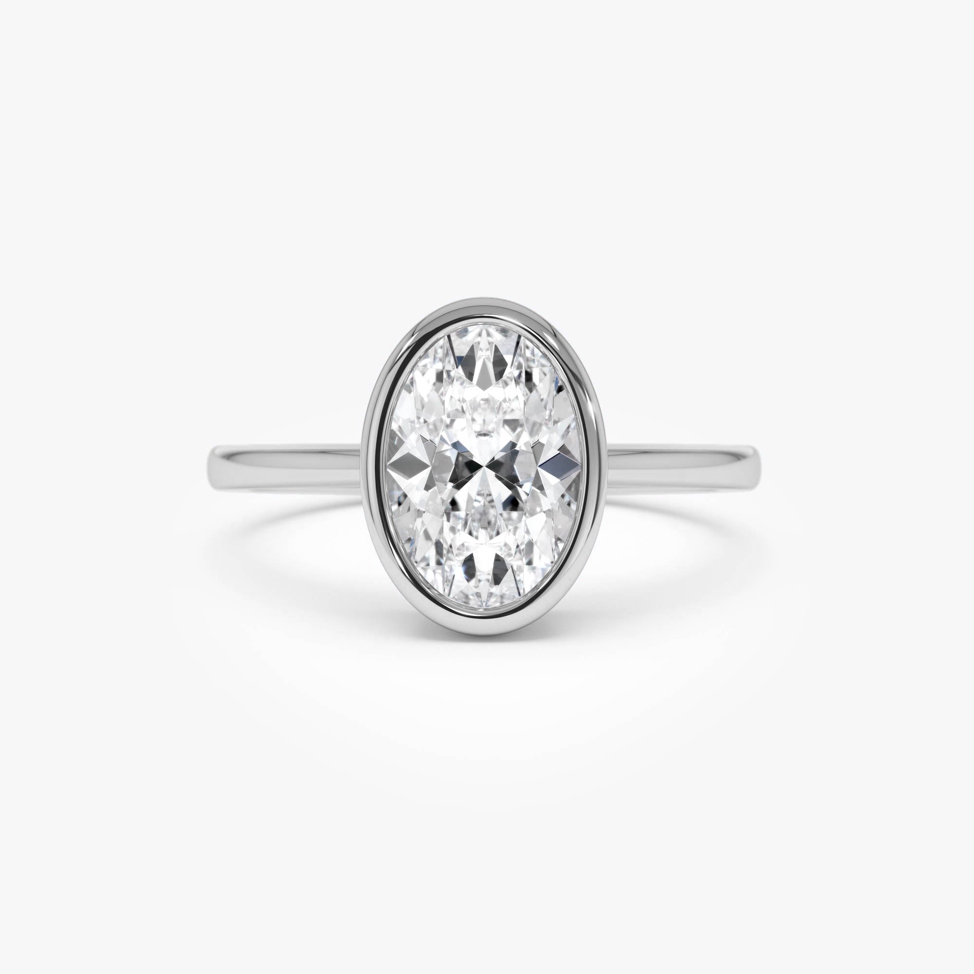 Oval Cut Lab Grown Diamond Bezel Setting Engagement Ring