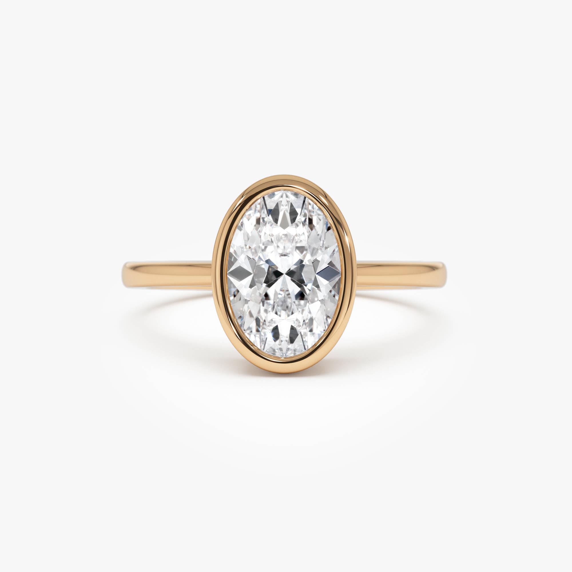 Oval Cut Lab Grown Diamond Bezel Setting Engagement Ring