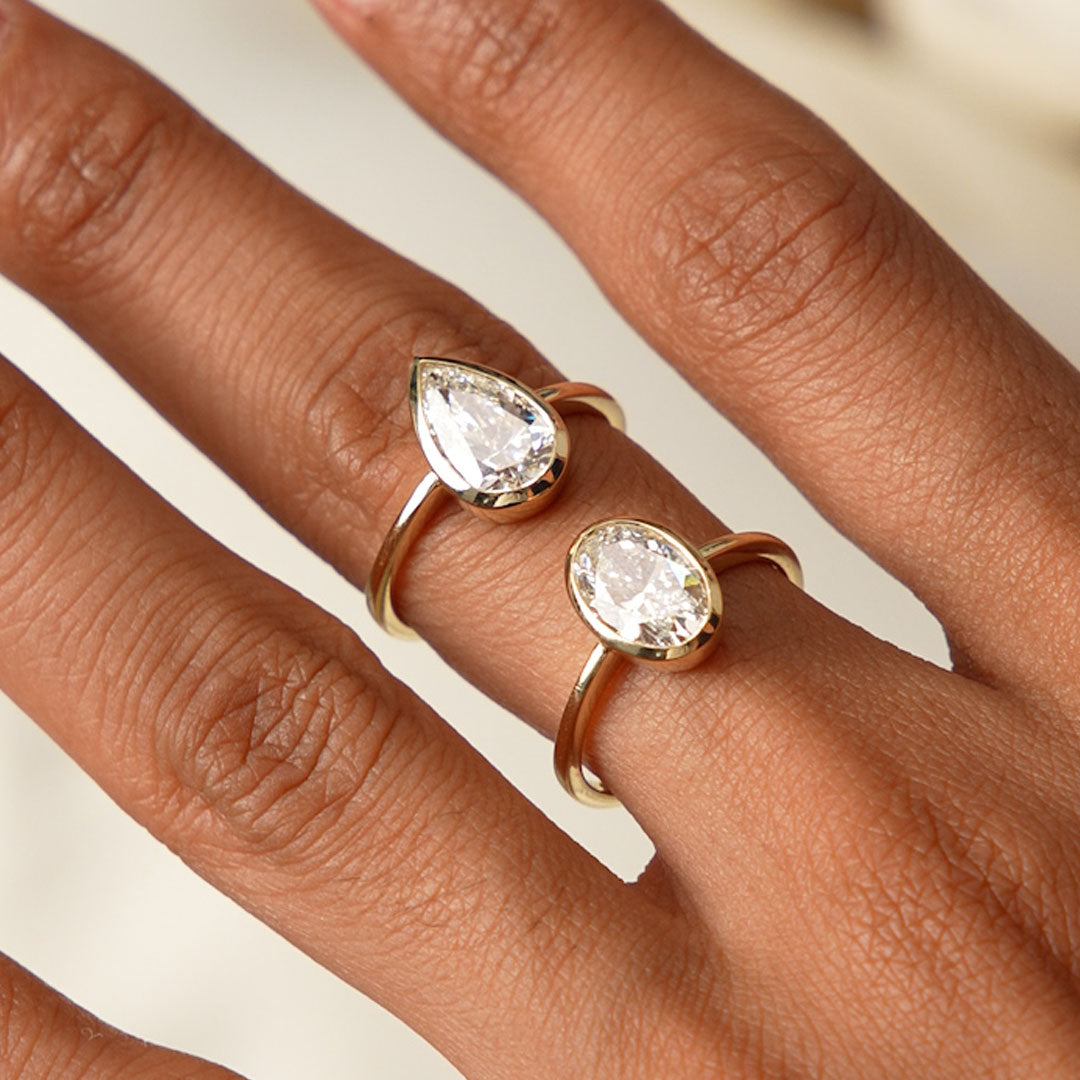 Oval Cut Lab Grown Diamond Bezel Setting Engagement Ring