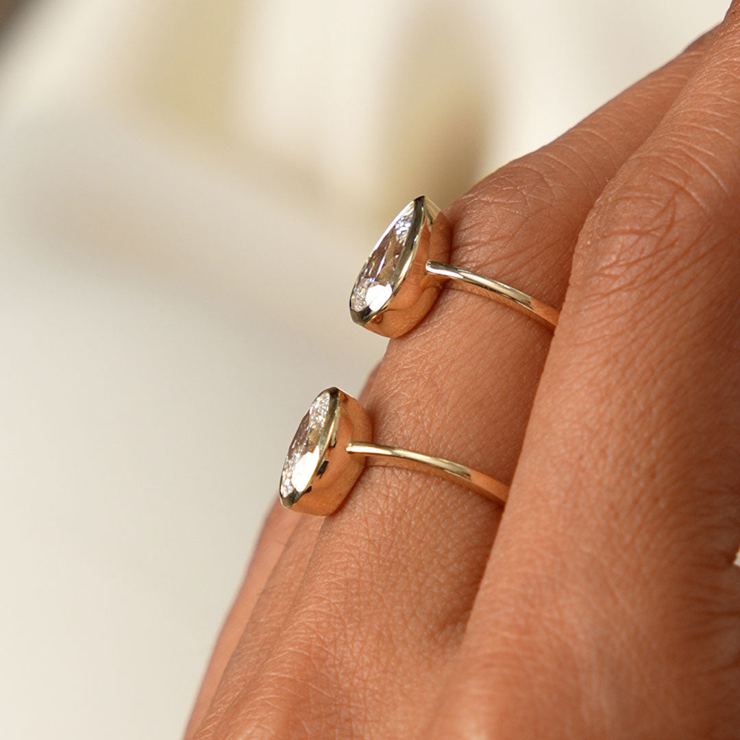 Oval Cut Lab Grown Diamond Bezel Setting Engagement Ring