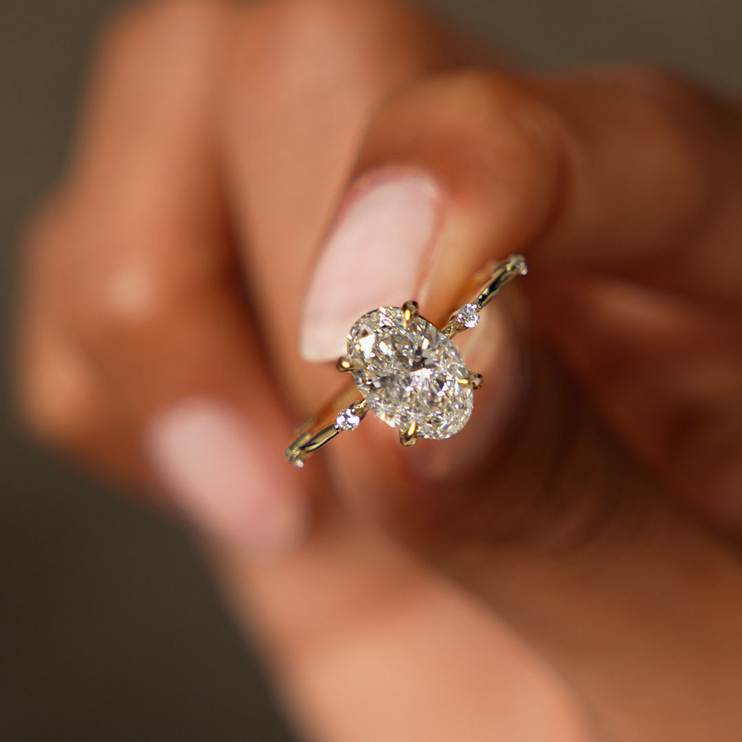 Oval Damond Engagement Ring With Accent Band