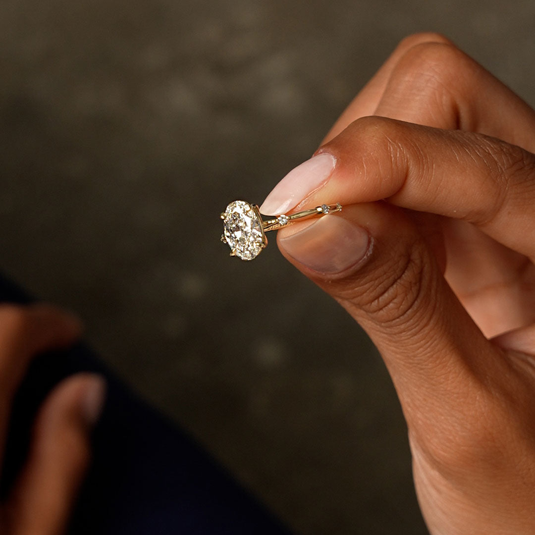 Oval Damond Engagement Ring With Accent Band
