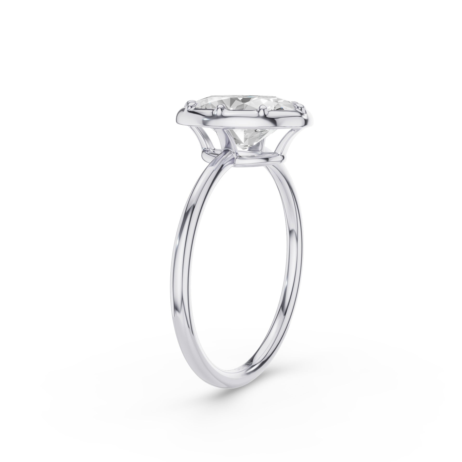A classic solitaire engagement ring featuring a round brilliant-cut diamond set in a polished white gold or platinum band, shown on a clean white background.