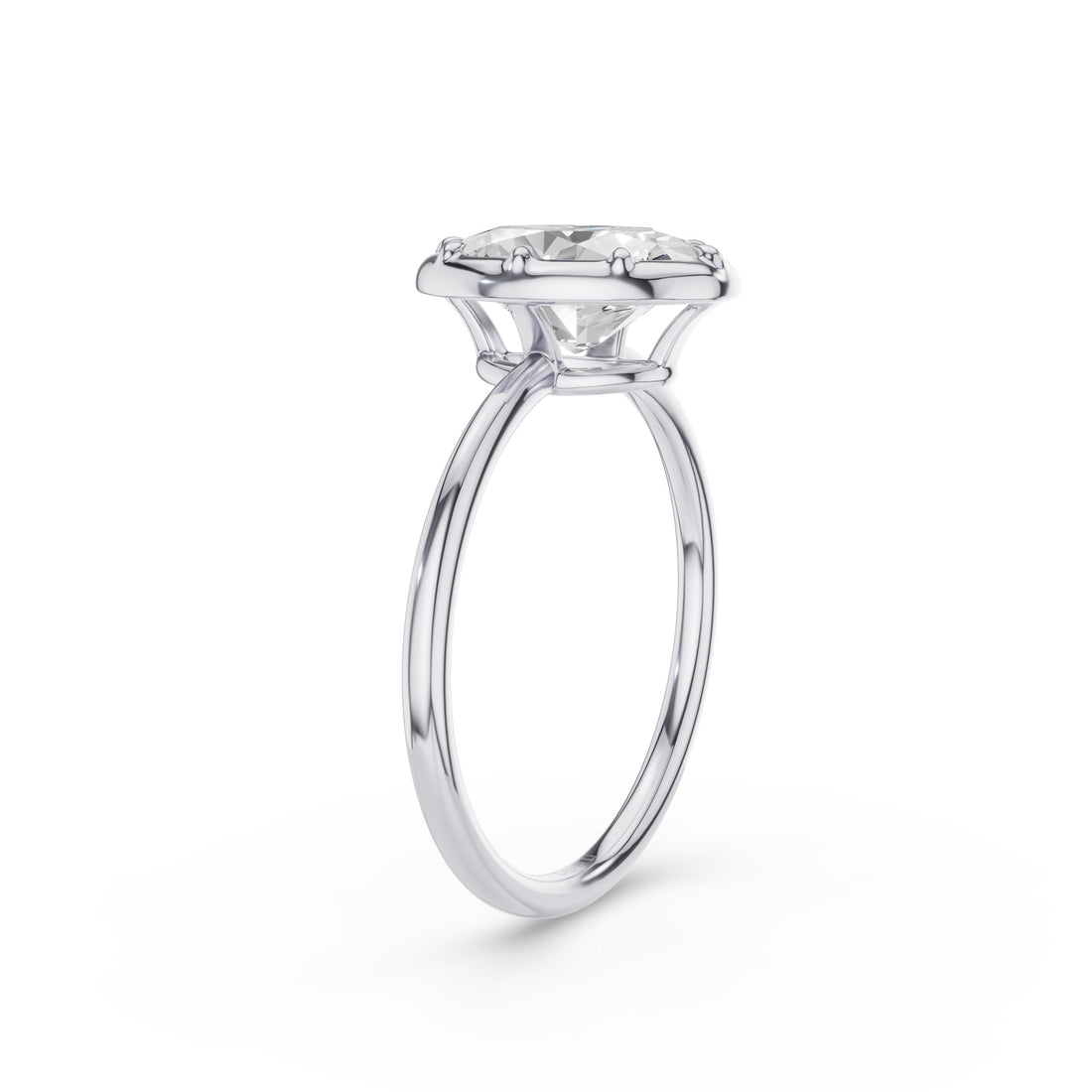 A classic solitaire engagement ring featuring a round brilliant-cut diamond set in a polished white gold or platinum band, shown on a clean white background.