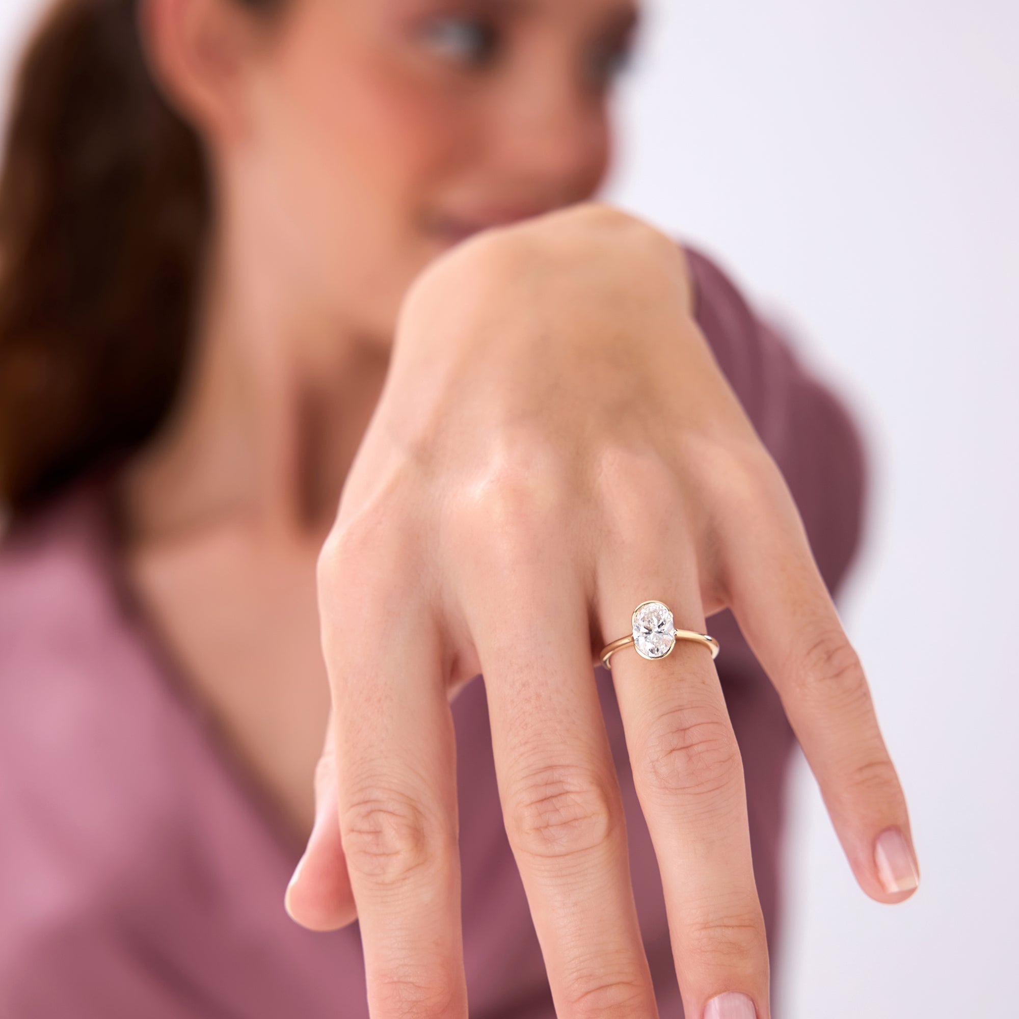 Oval Shaped Diamond Half Bezel Set Engagement Ring
