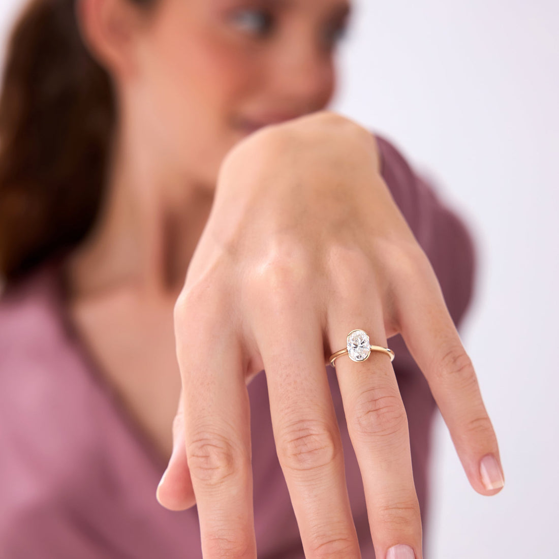 Oval Shaped Diamond Half Bezel Set Engagement Ring