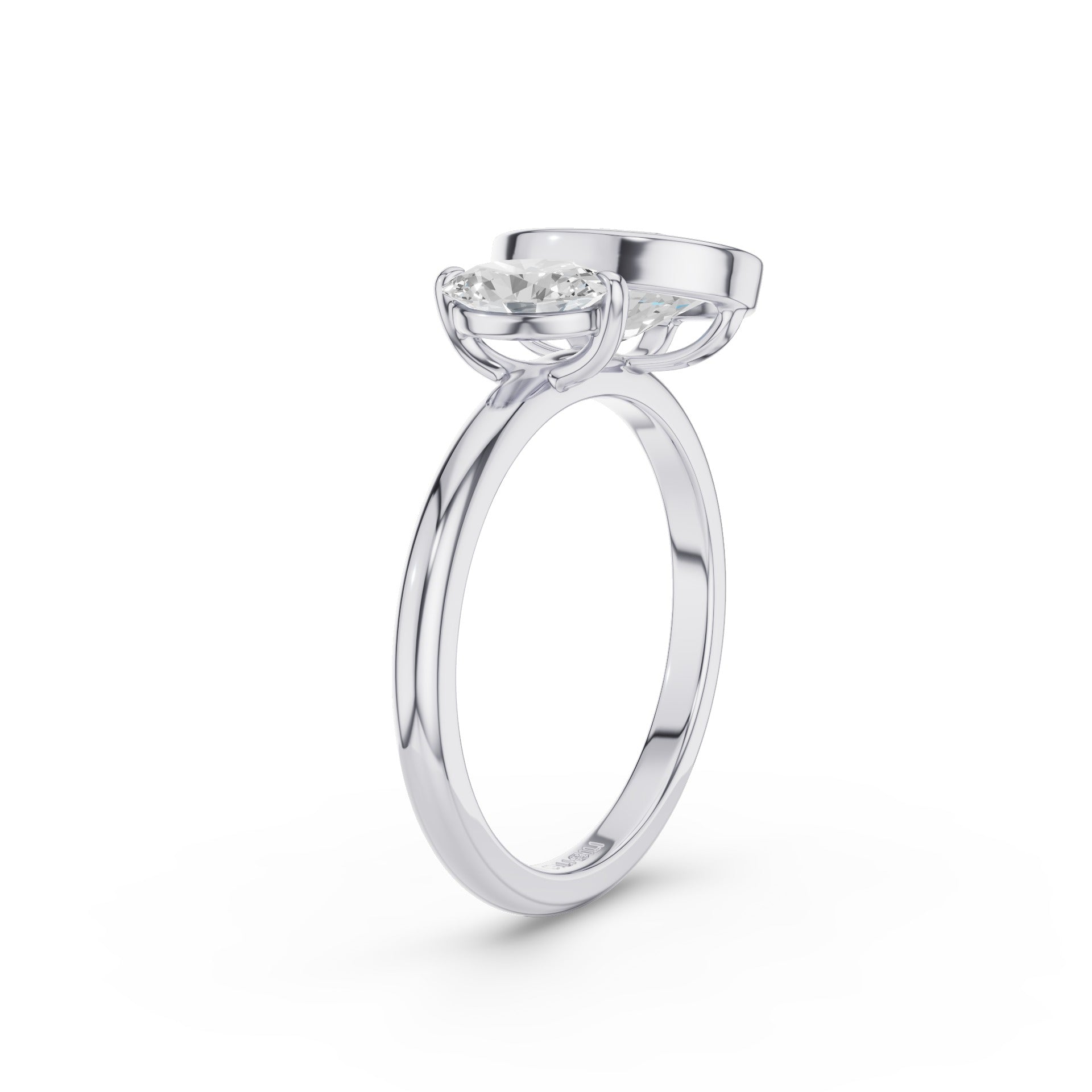 A silver-toned solitaire engagement ring with a round brilliant-cut diamond, shown in a three-quarter view on a clean white background.