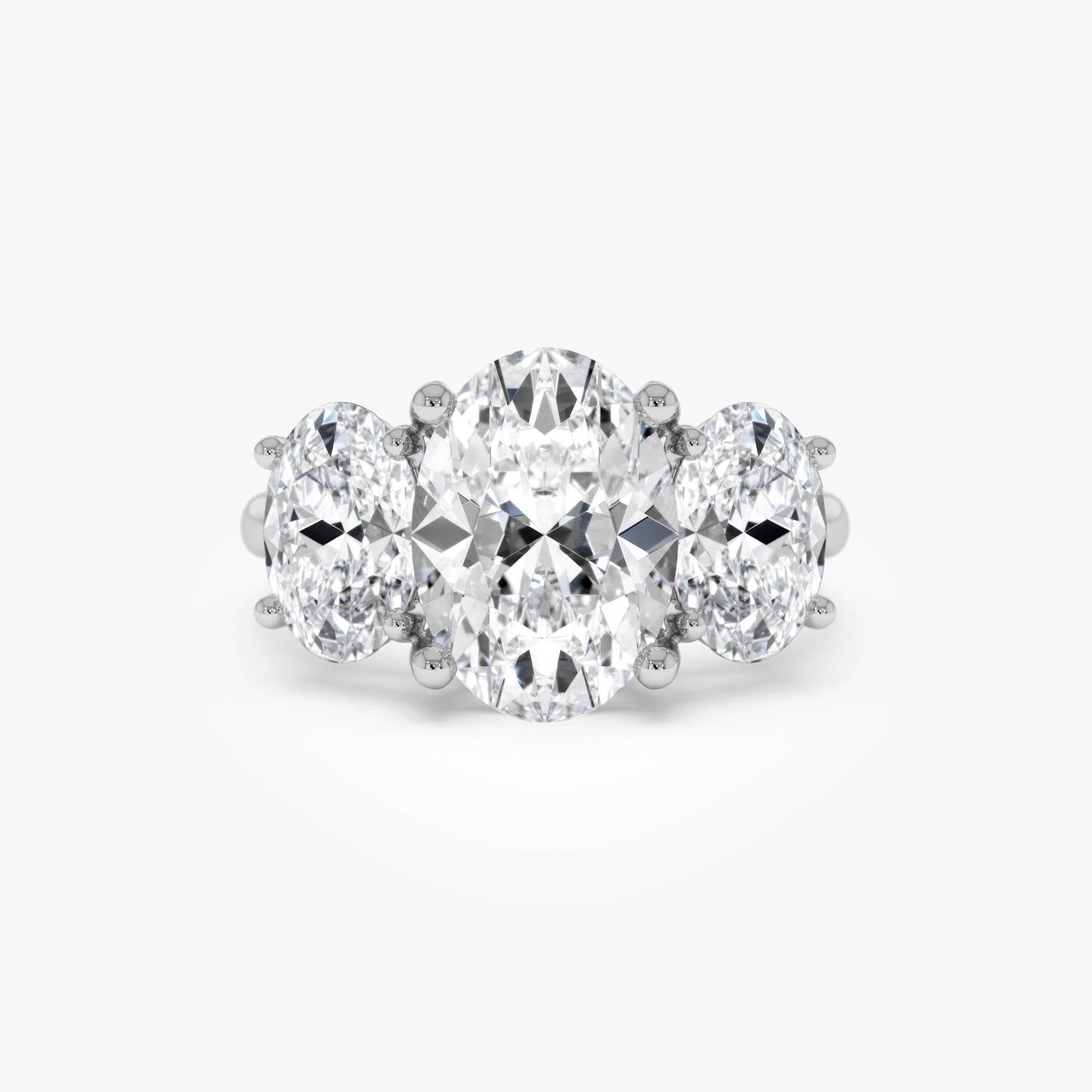 Oval Three Stone Diamond Engagement Ring