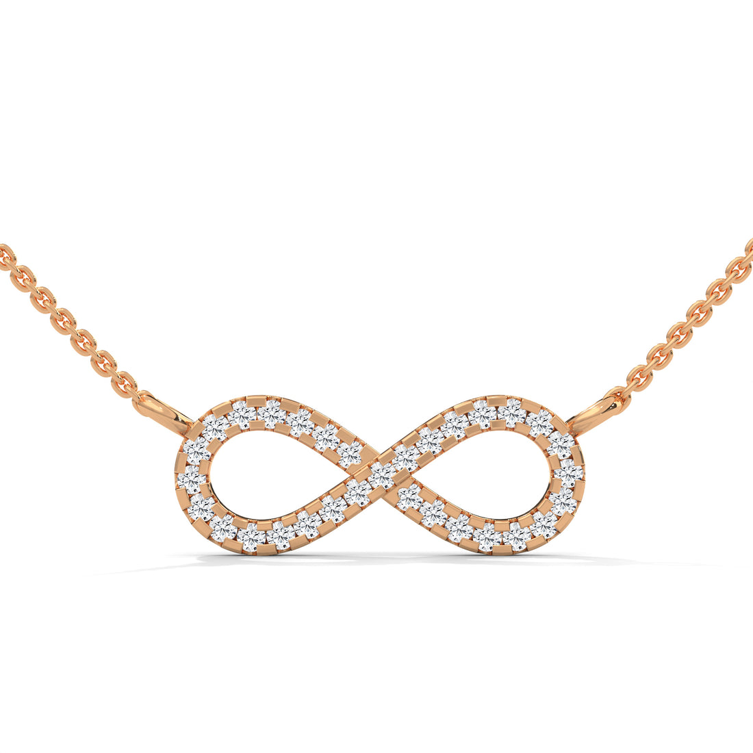 Rose gold infinity necklace with diamonds on a white background