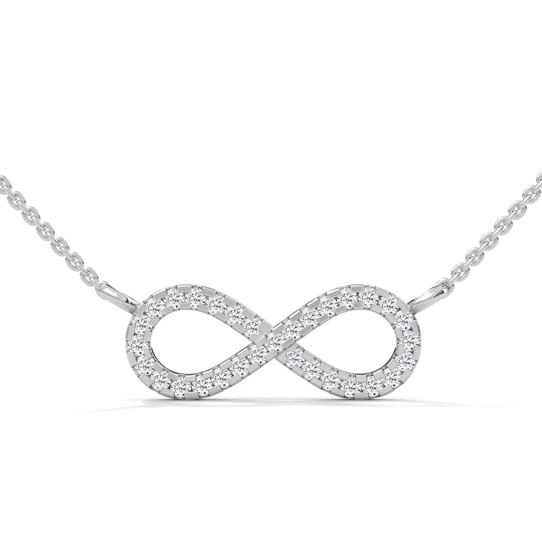 Silver infinity necklace on a white background