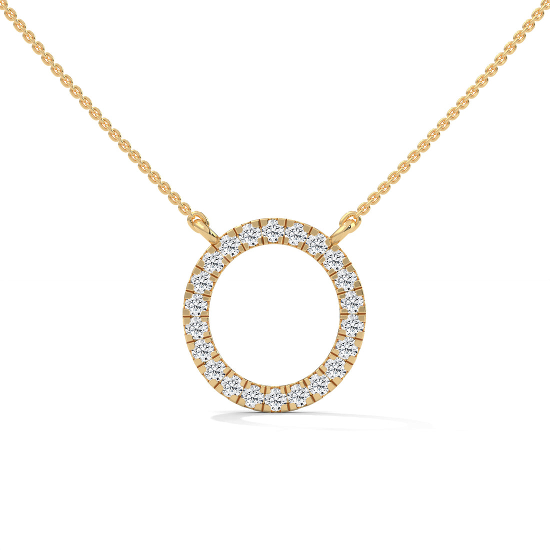 Gold necklace with a round diamond pendant on a white background