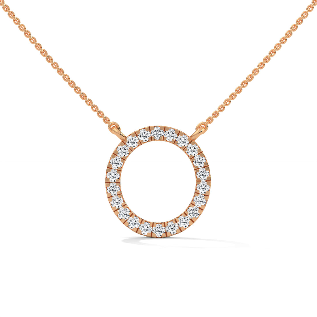 Rose gold necklace with a circular diamond pendant on a white background