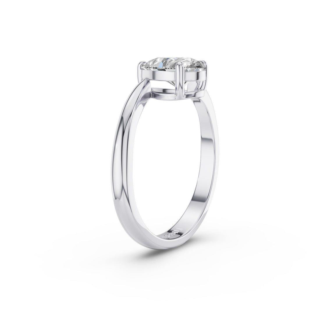 A classic solitaire engagement ring featuring a round brilliant-cut diamond set in a polished white gold or platinum band, shown on a clean white background.