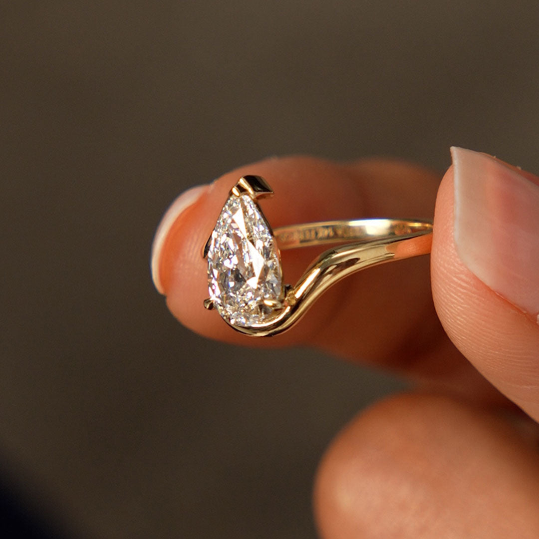 Pear Shape Lab Diamond Engagement Ring with Modern Bypass Design