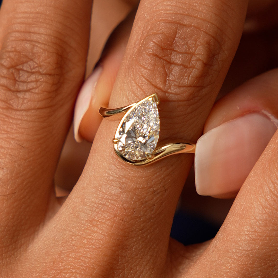 Pear Shape Lab Diamond Engagement Ring with Modern Bypass Design