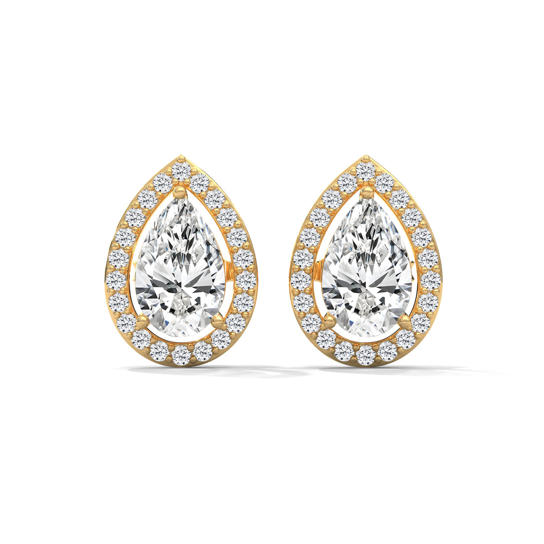Pair of gold teardrop earrings with clear gemstones on a white background