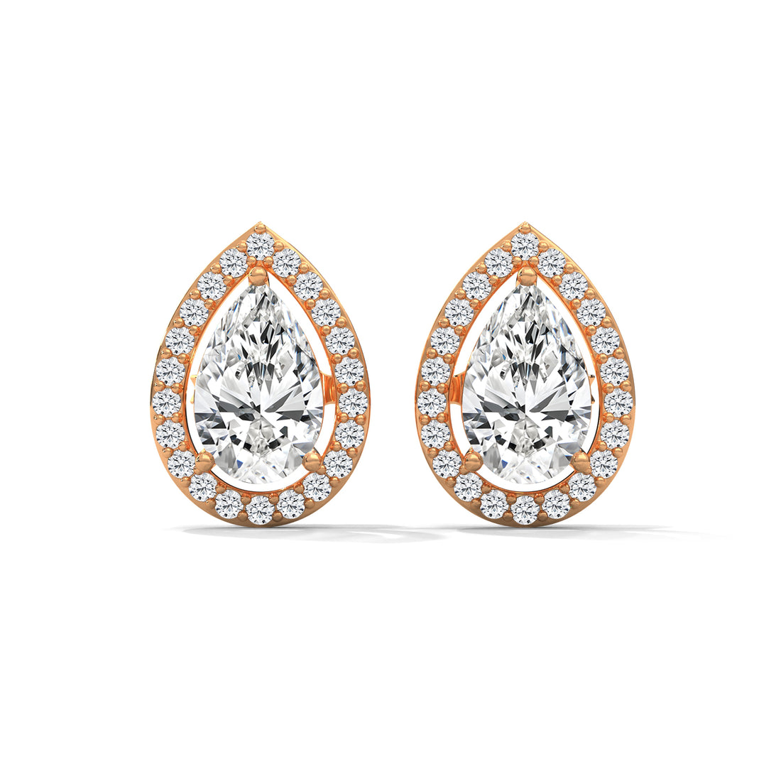 Pair of pear-shaped diamond earrings with rose gold setting on a white background