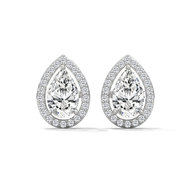 Pair of pear-shaped diamond earrings on a white background