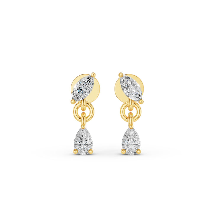 A pair of gold drop earrings featuring marquise-cut clear gemstones at the top and pear-cut clear gemstones at the bottom, set against a plain white background.