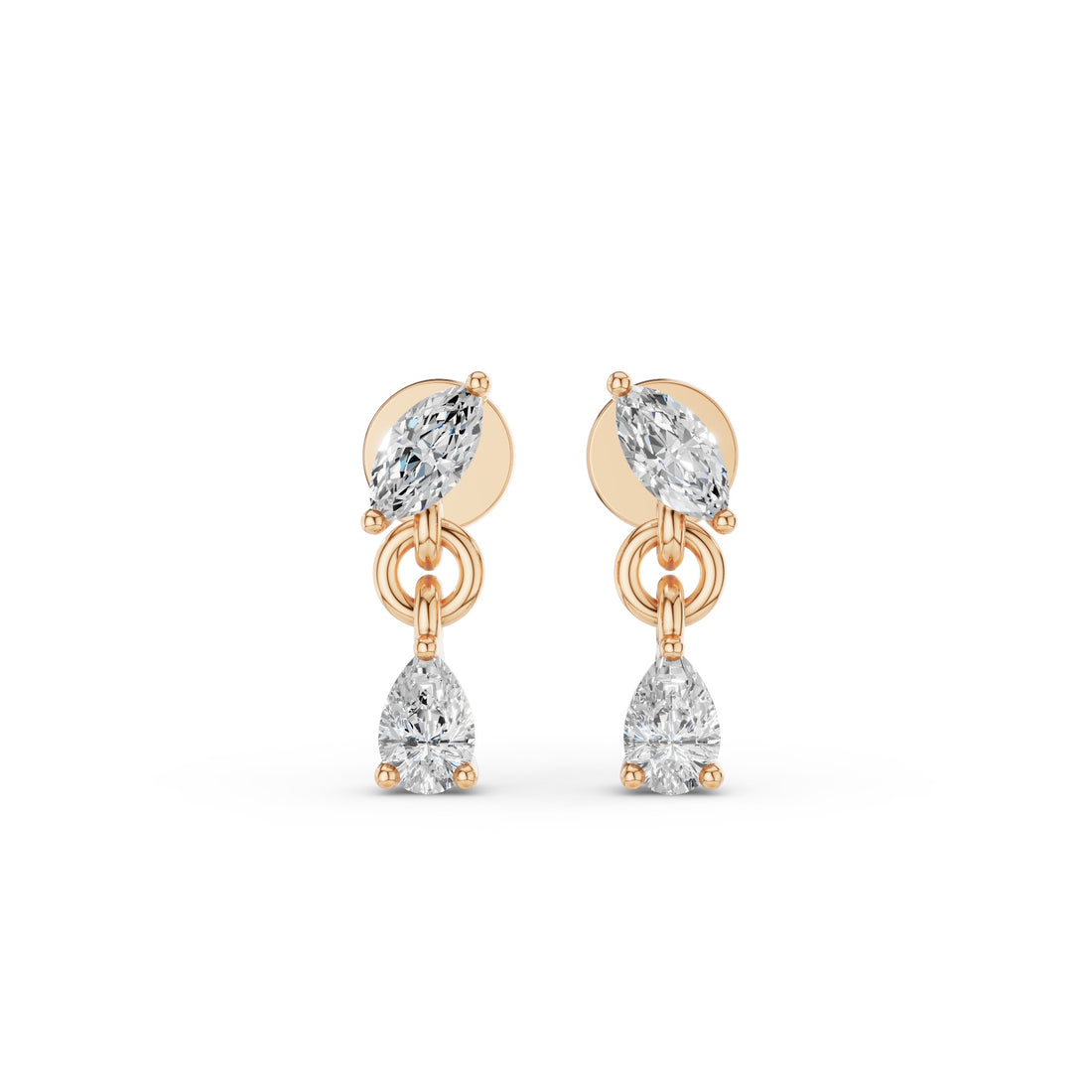 A pair of gold drop earrings featuring marquise-cut and pear-cut clear gemstones, set against a plain white background.