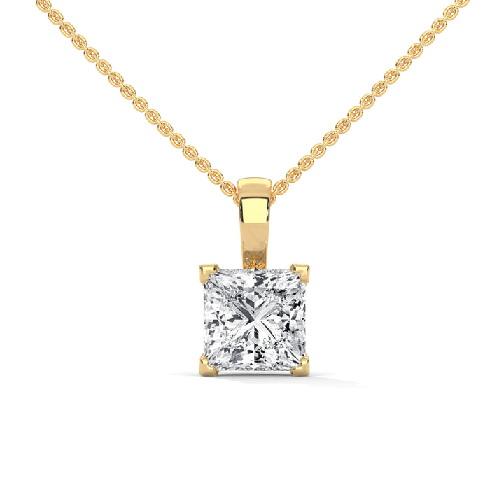 Gold necklace with a diamond pendant on a white background