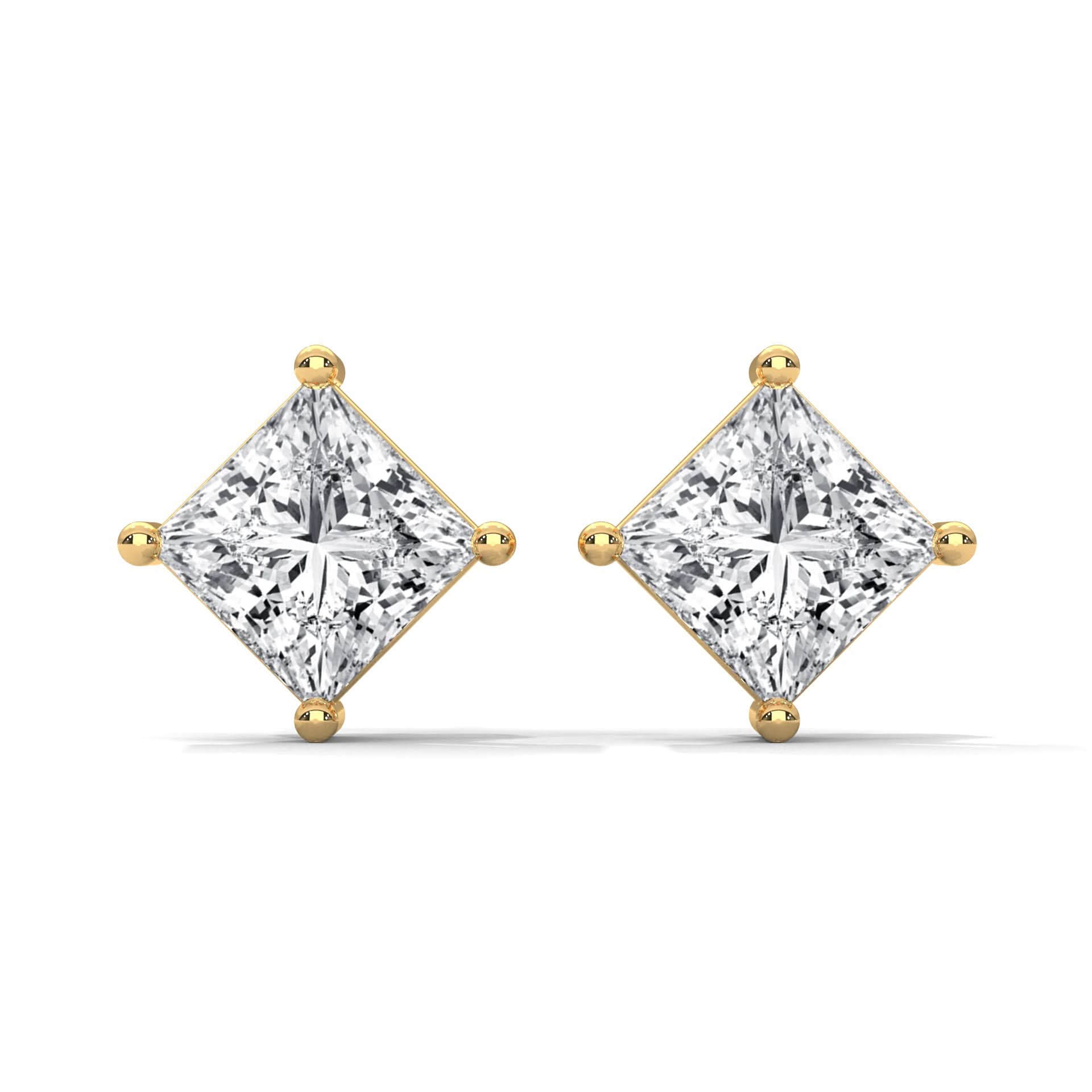 Pair of diamond stud earrings on a white background