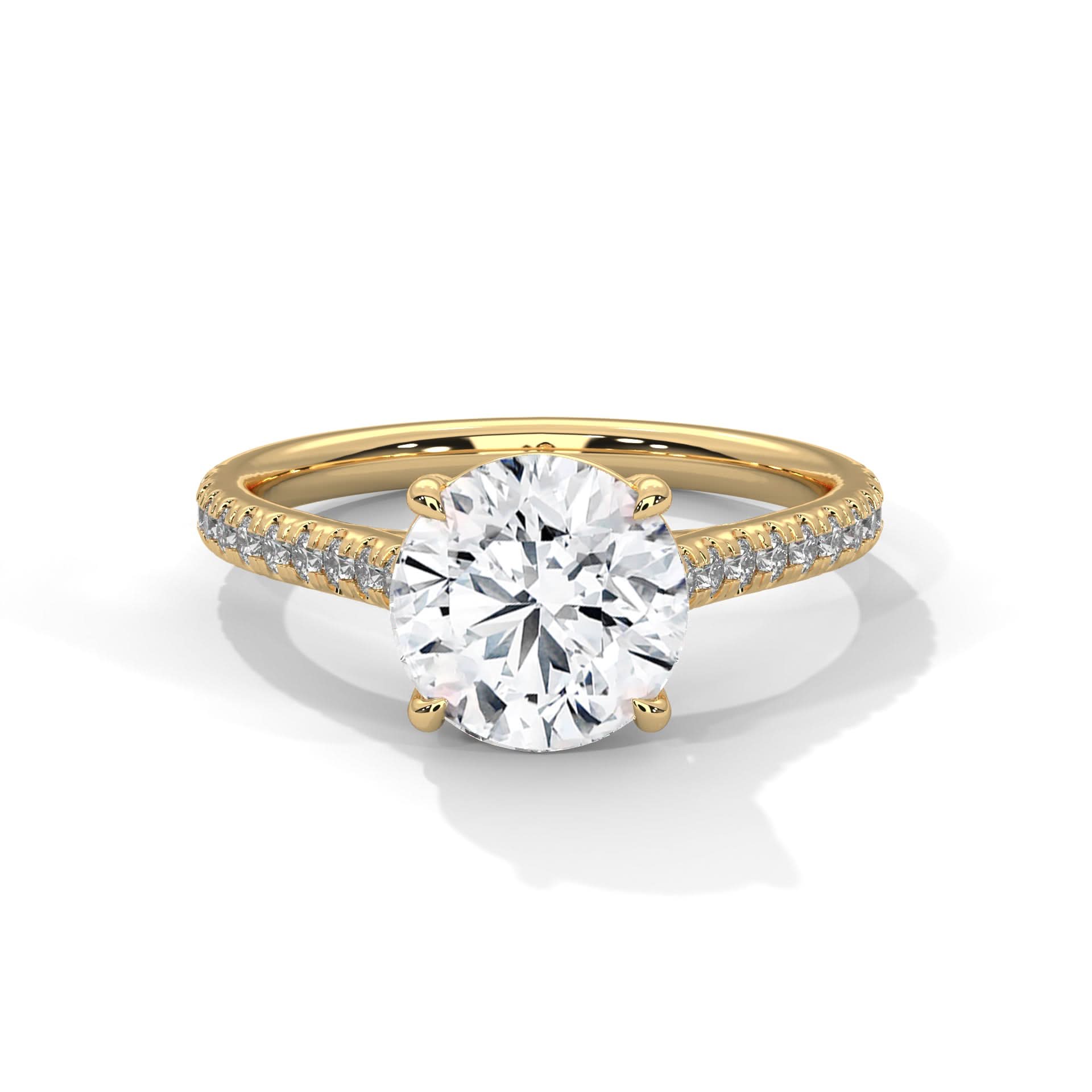 Gold ring with a large diamond and smaller diamonds on the band against a white background