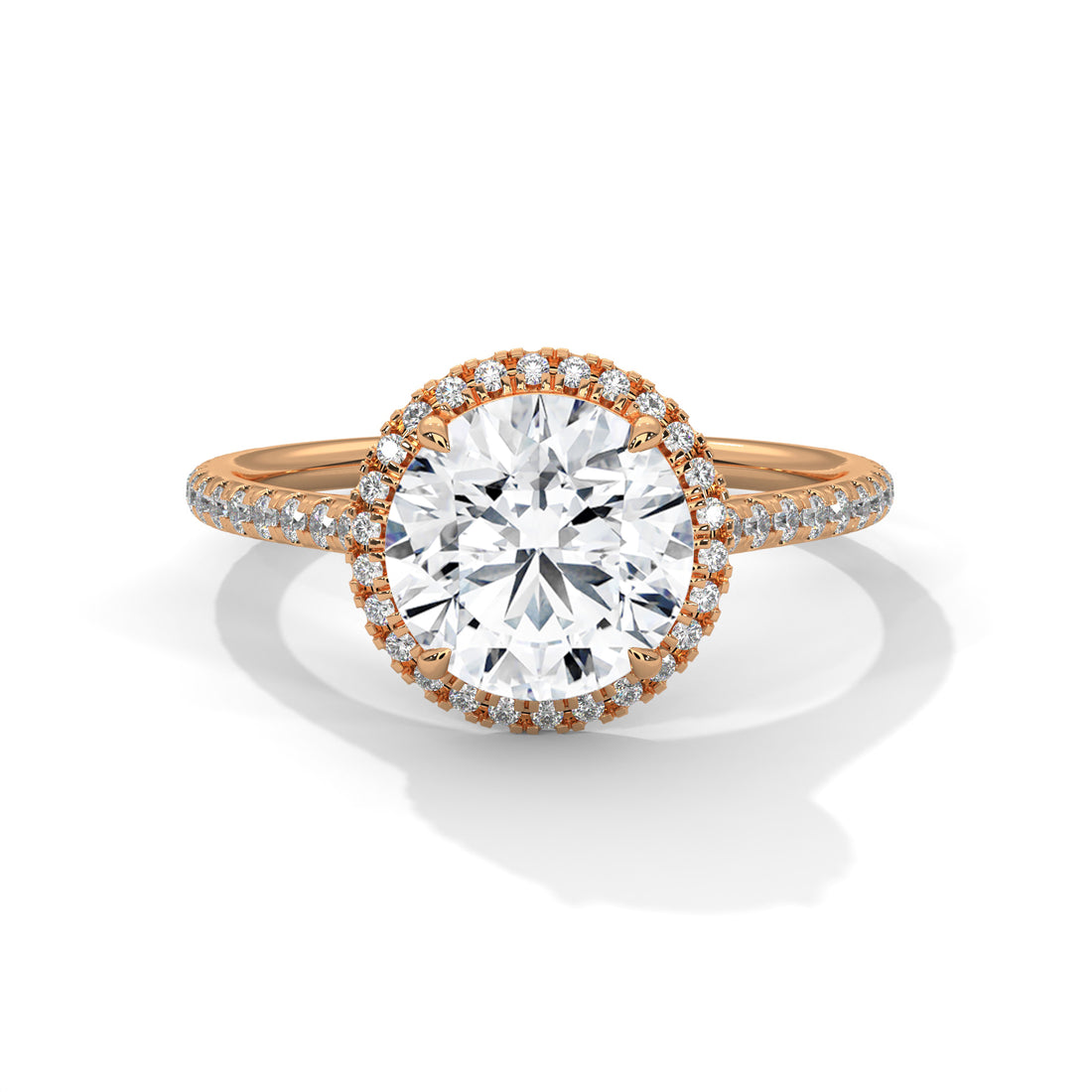 Rose gold diamond ring with a large central gemstone and smaller stones on a white background