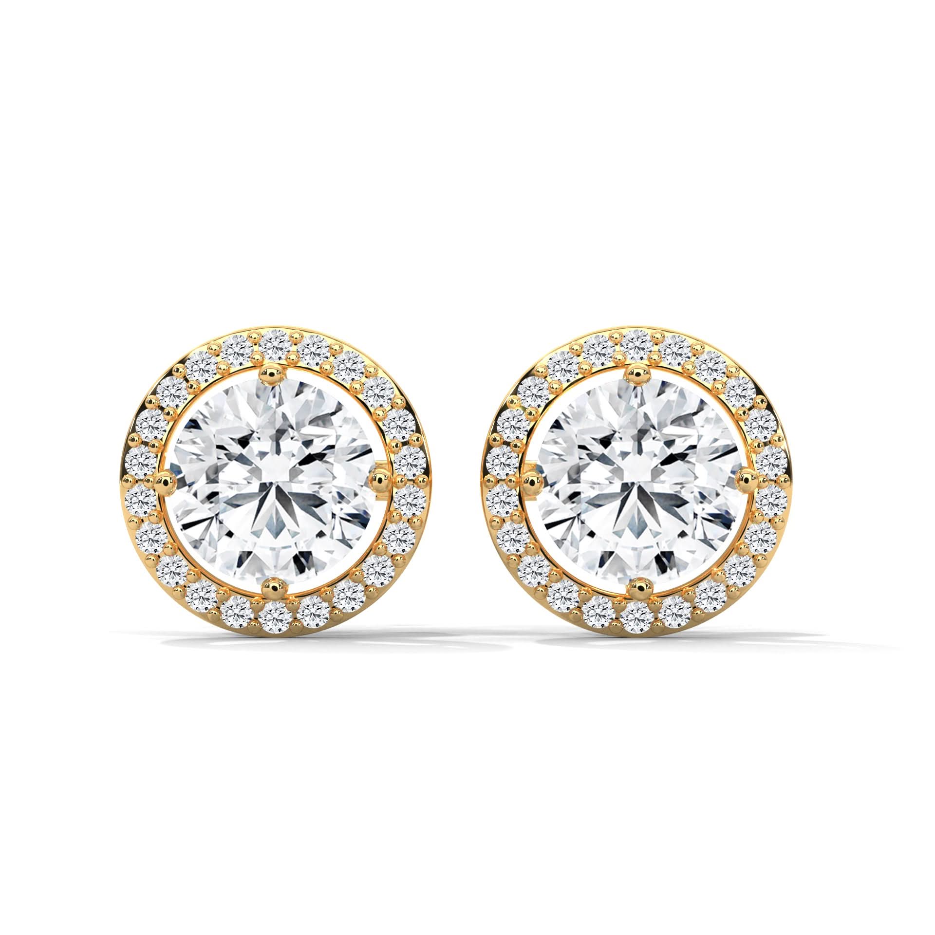 Pair of gold and diamond earrings on a white background