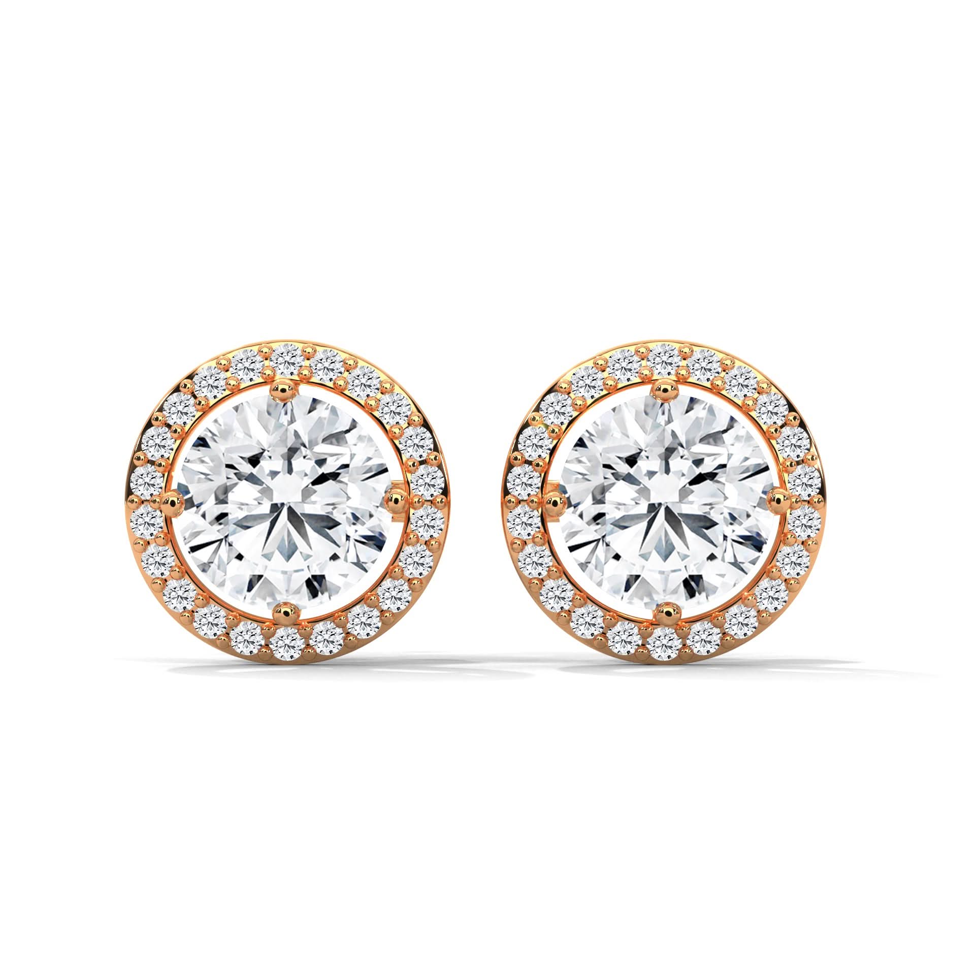 Pair of diamond earrings with rose gold and white gold setting on a white background