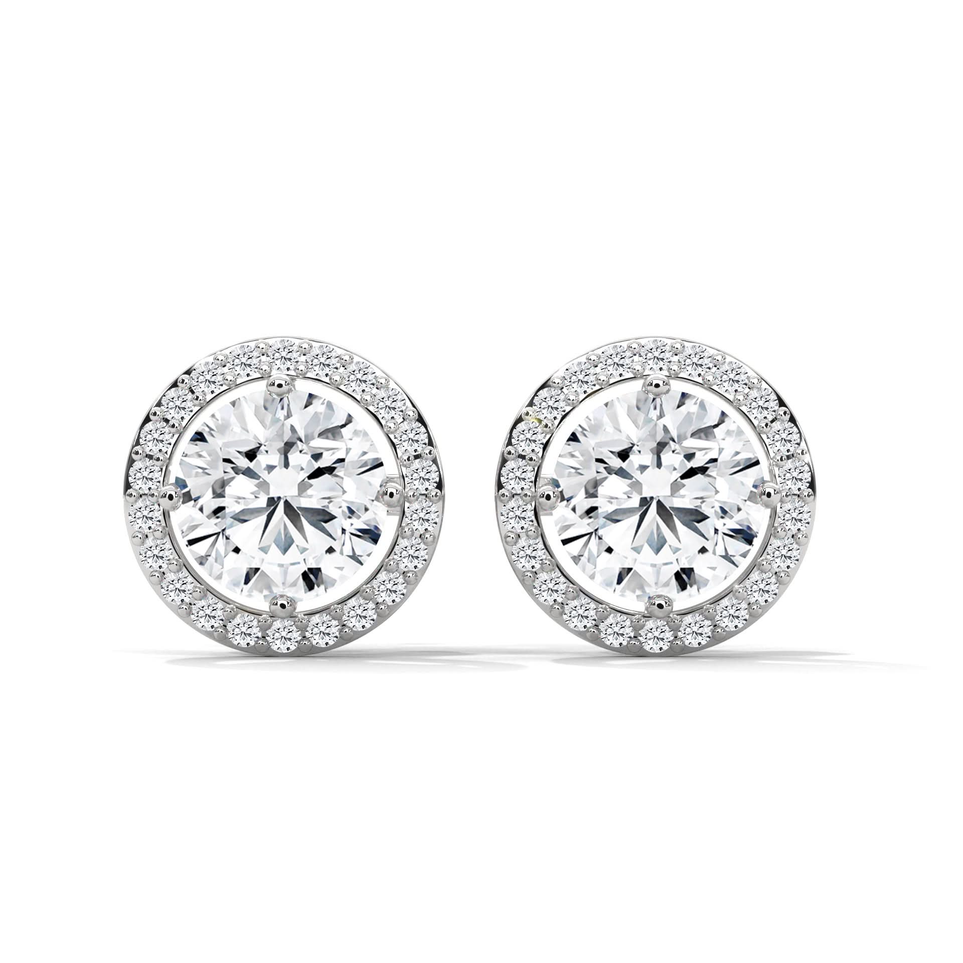 Pair of diamond stud earrings on a white background
