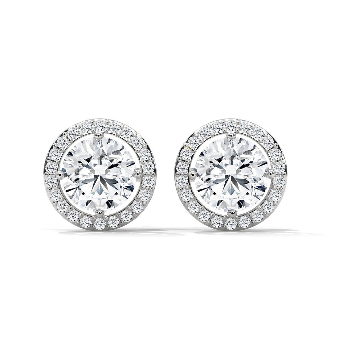Pair of diamond stud earrings on a white background