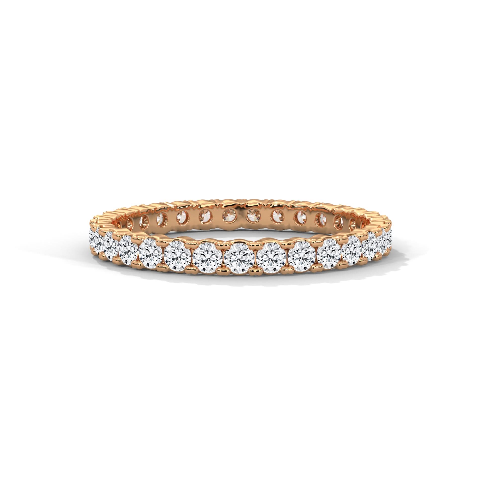 Rose gold ring with diamonds on a white background