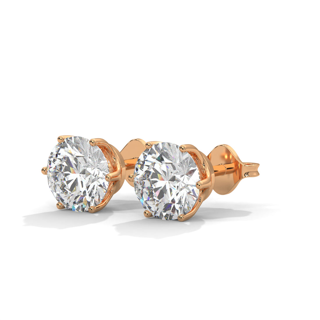 Rose gold stud earrings with clear gemstones on a white background