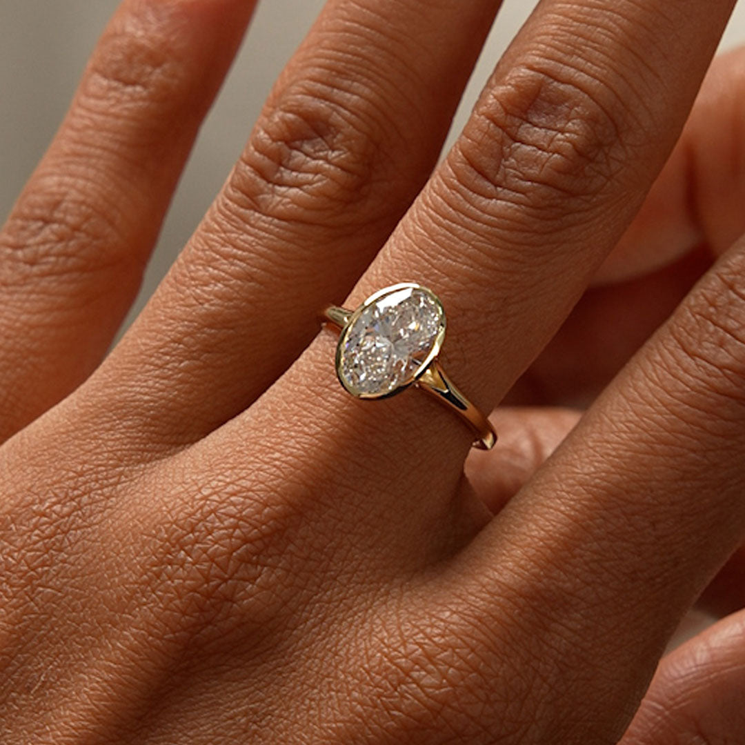 Solitaire Oval Cut Bezel Set Lab Diamond Engagement Ring