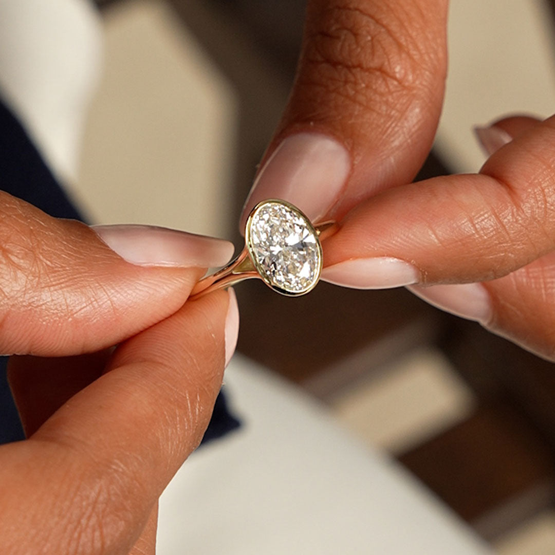Solitaire Oval Cut Bezel Set Lab Diamond Engagement Ring