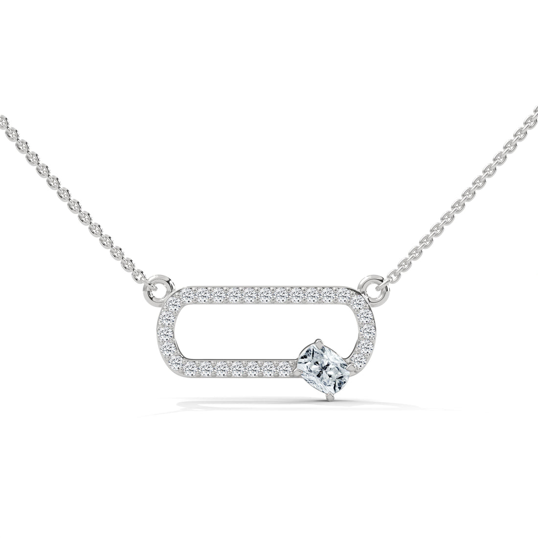 Silver necklace with a heart-shaped diamond pendant on a white background