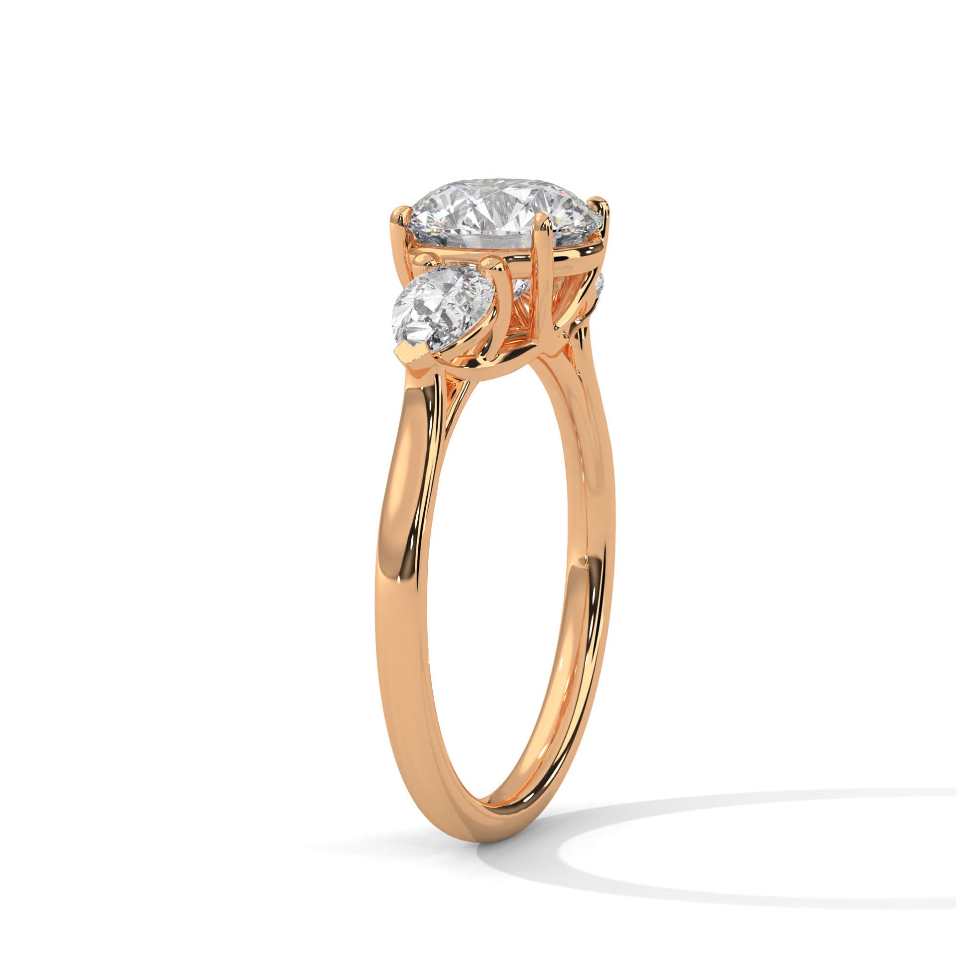 Three stone rose gold ring