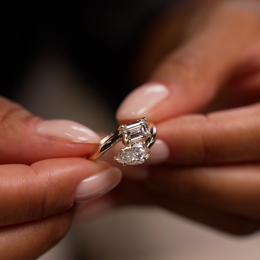 Toi et Moi Emerald And Pear Shape Sleek Design Diamond Ring