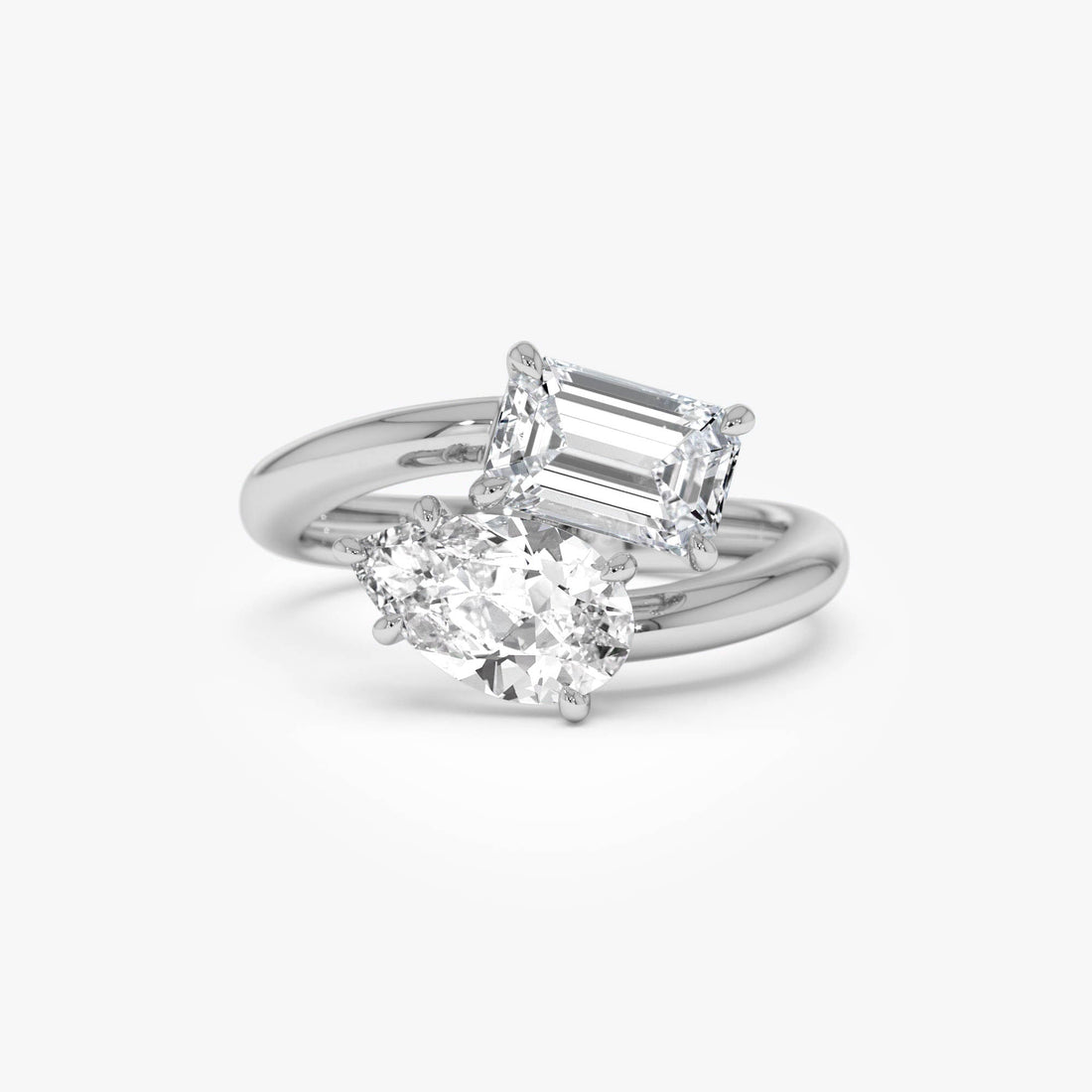 Toi et Moi Emerald And Pear Shape Sleek Design Diamond Ring