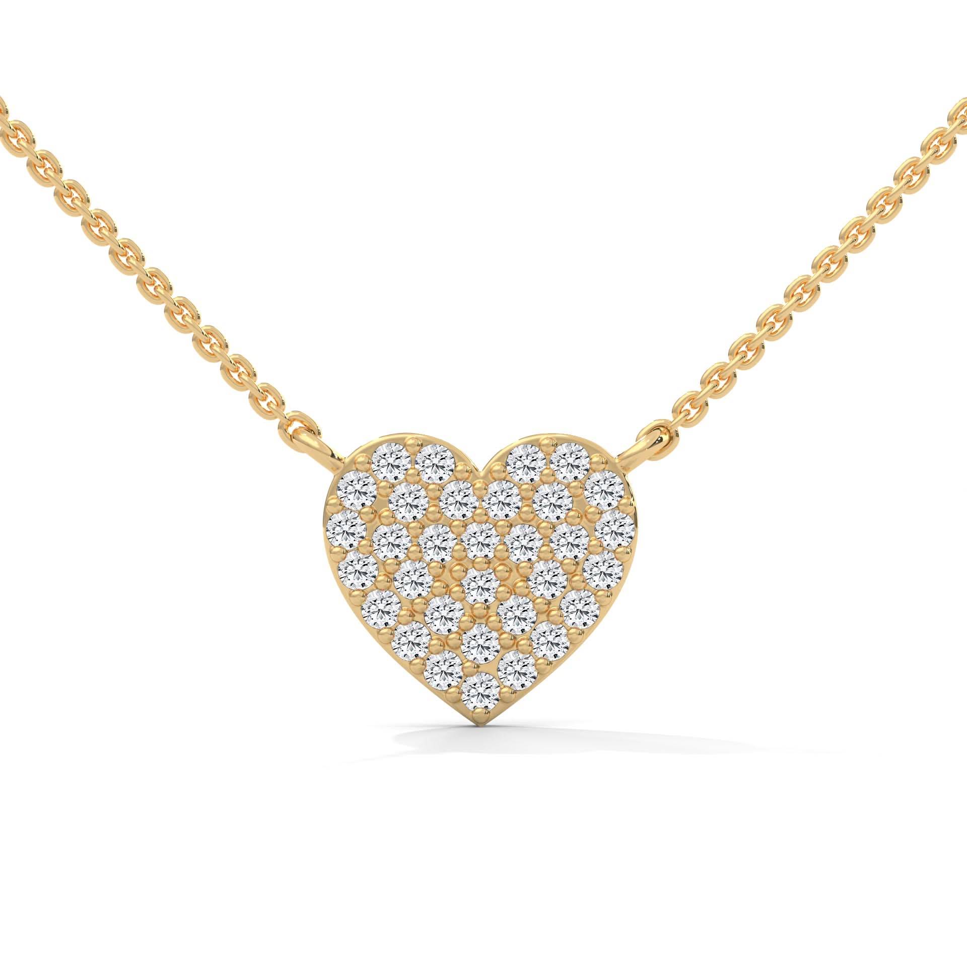 Gold necklace with a heart-shaped diamond pendant on a white background