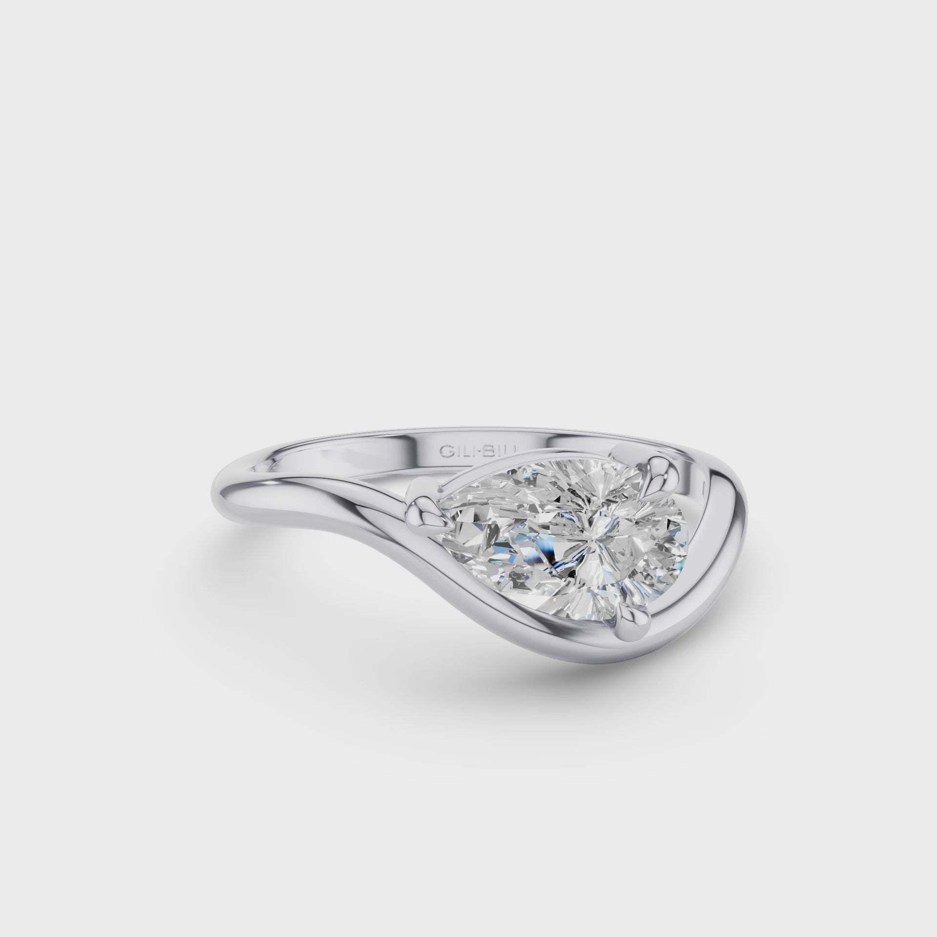 Modern Wavy Pear Shaped Lab Grown Diamond Engagement Ring
