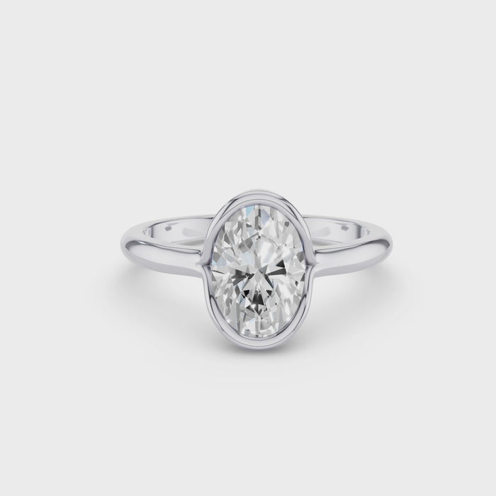 Oval Shaped Diamond Half Bezel Set Engagement Ring