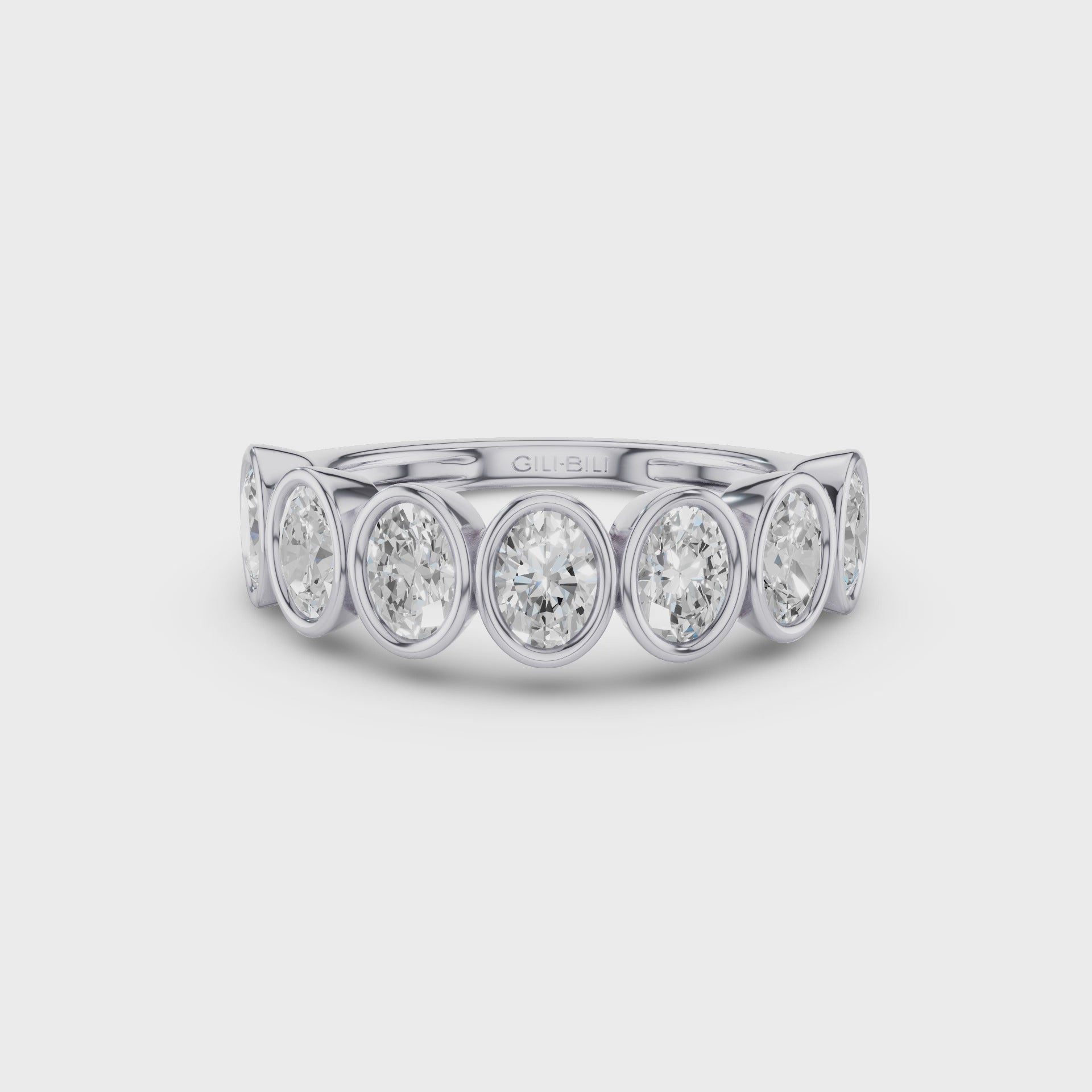 Seven Stone Oval Diamond Bezel Setting Wedding Ring